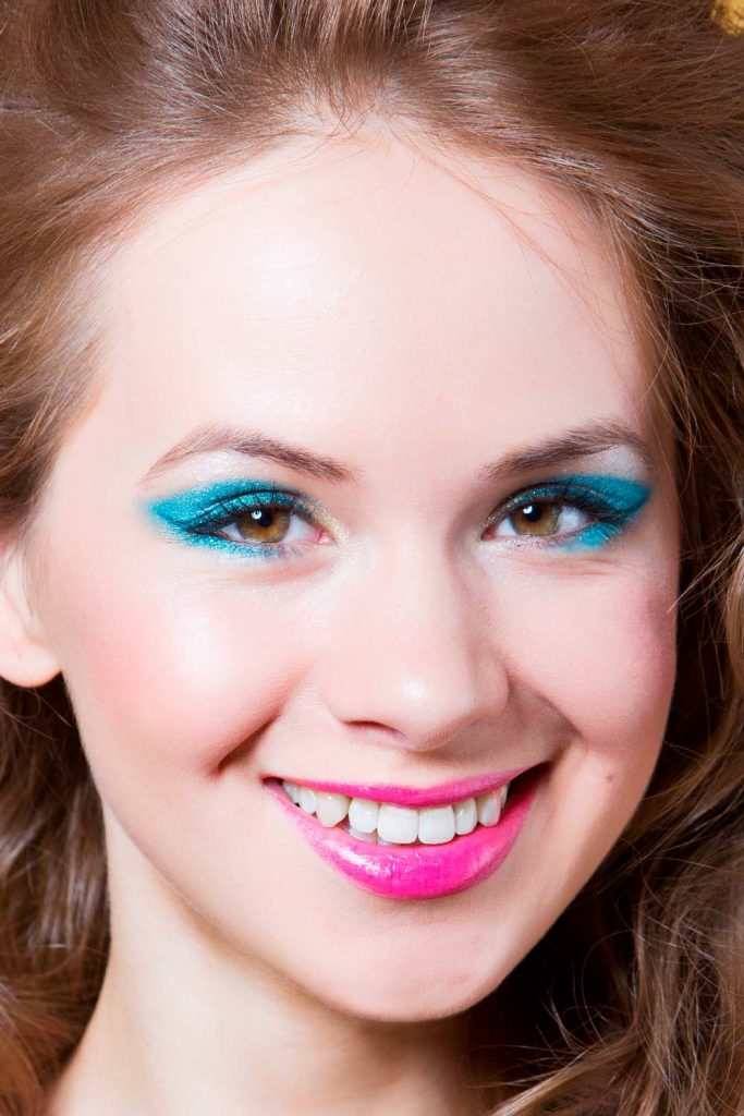 Blue Glitter Eyeshadow With Purple Lipstick