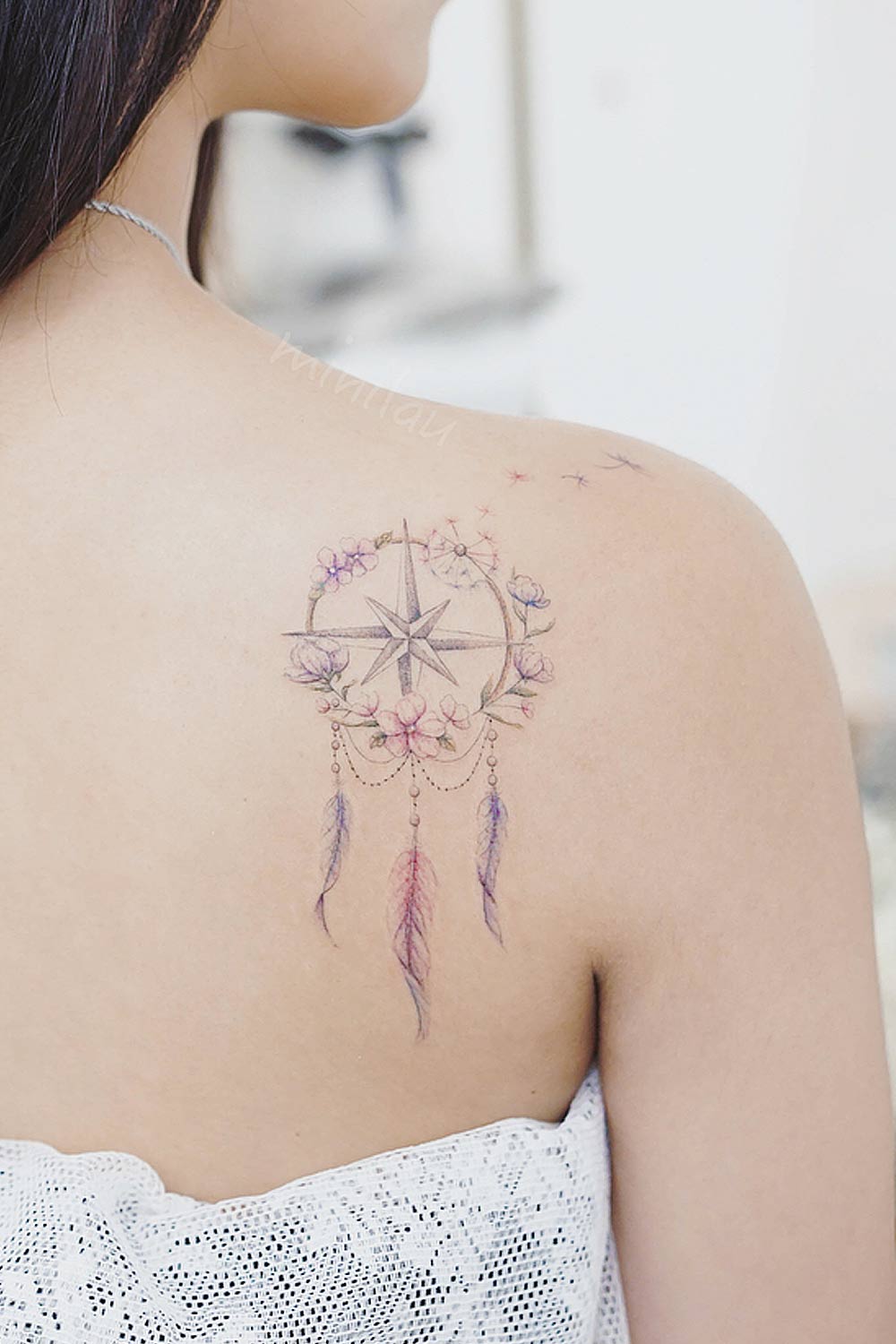 compass dreamcatcher tattoo