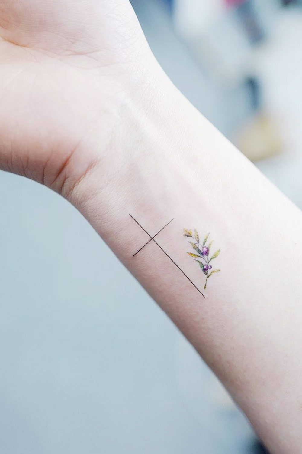 Cross Tattoo with Rosemary Leaves