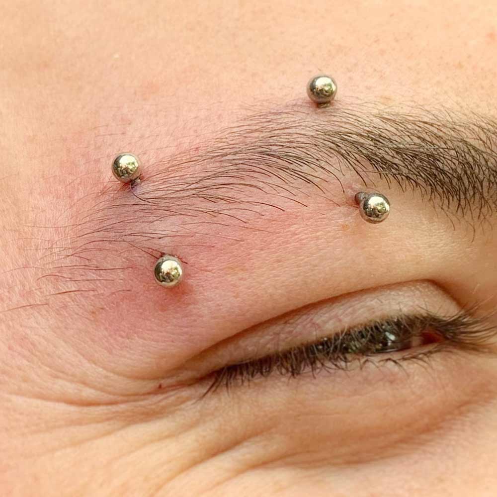 Double Eyebrow Piercing