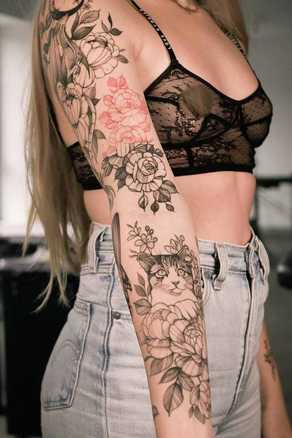 Floral Tattoo Sleeve with a Cat Design