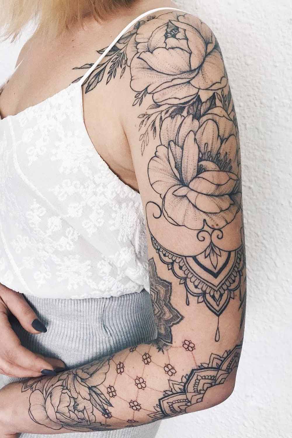 Floral Tattoo Sleeve with Mandala Accent