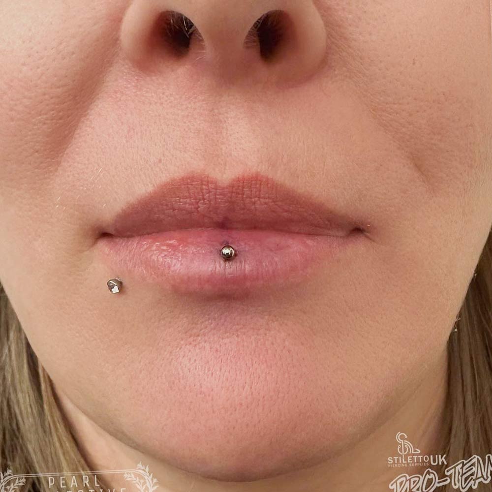 Inverse vertical labret on sale scar