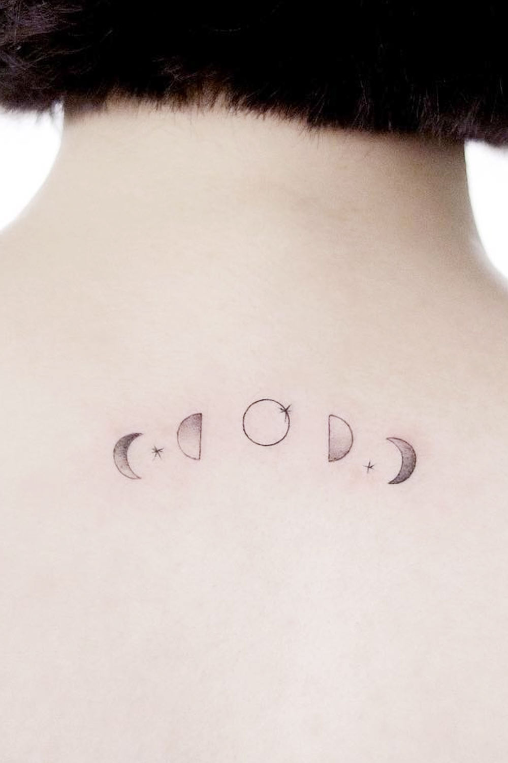 Minimalist Moon Phases Tattoo Design