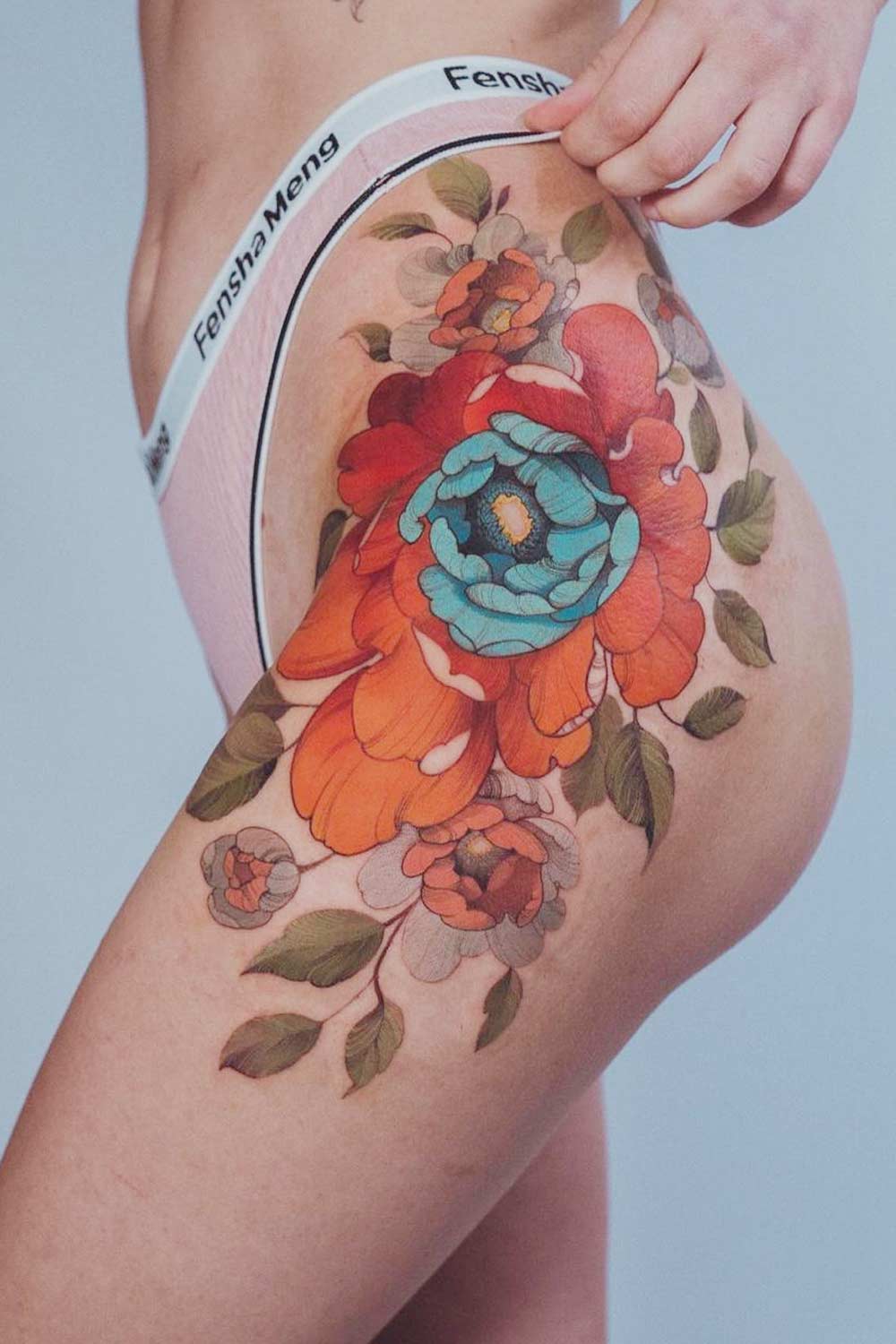 Thigh Tattoo with Peonies