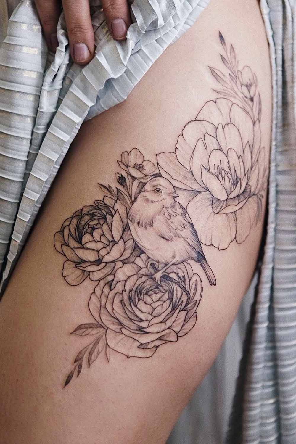 A Bird with Flowers Tattoo Idea