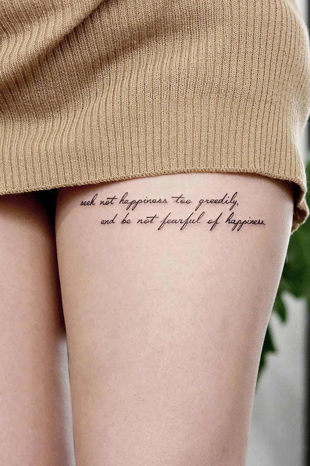 Minimalist Lettering Thigh Tattoo