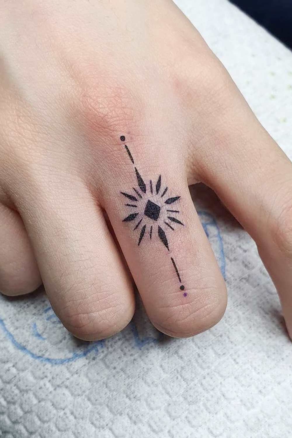 Finger Tattoo Design with Star
