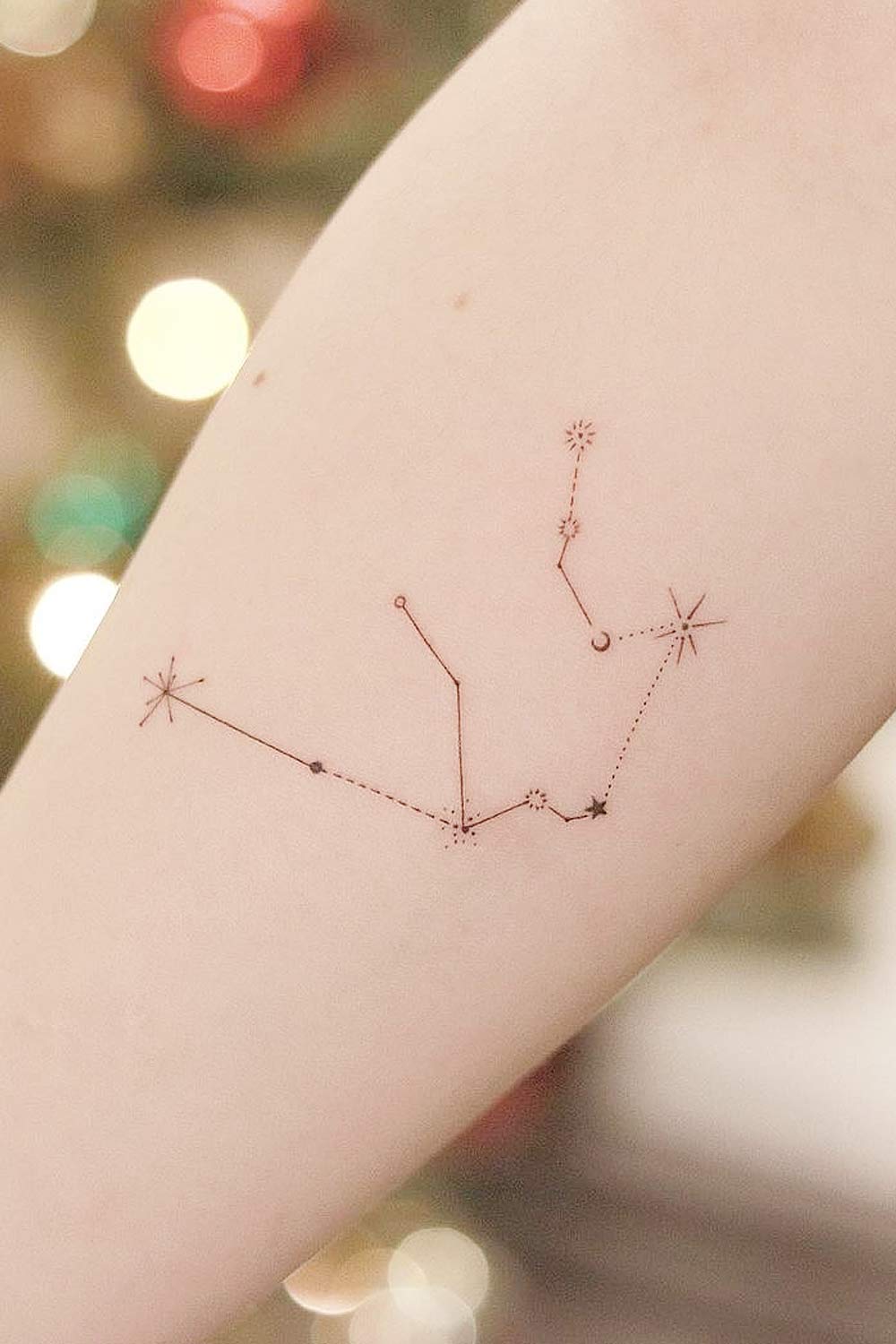 Constellation Tattoo with Stars and Planets
