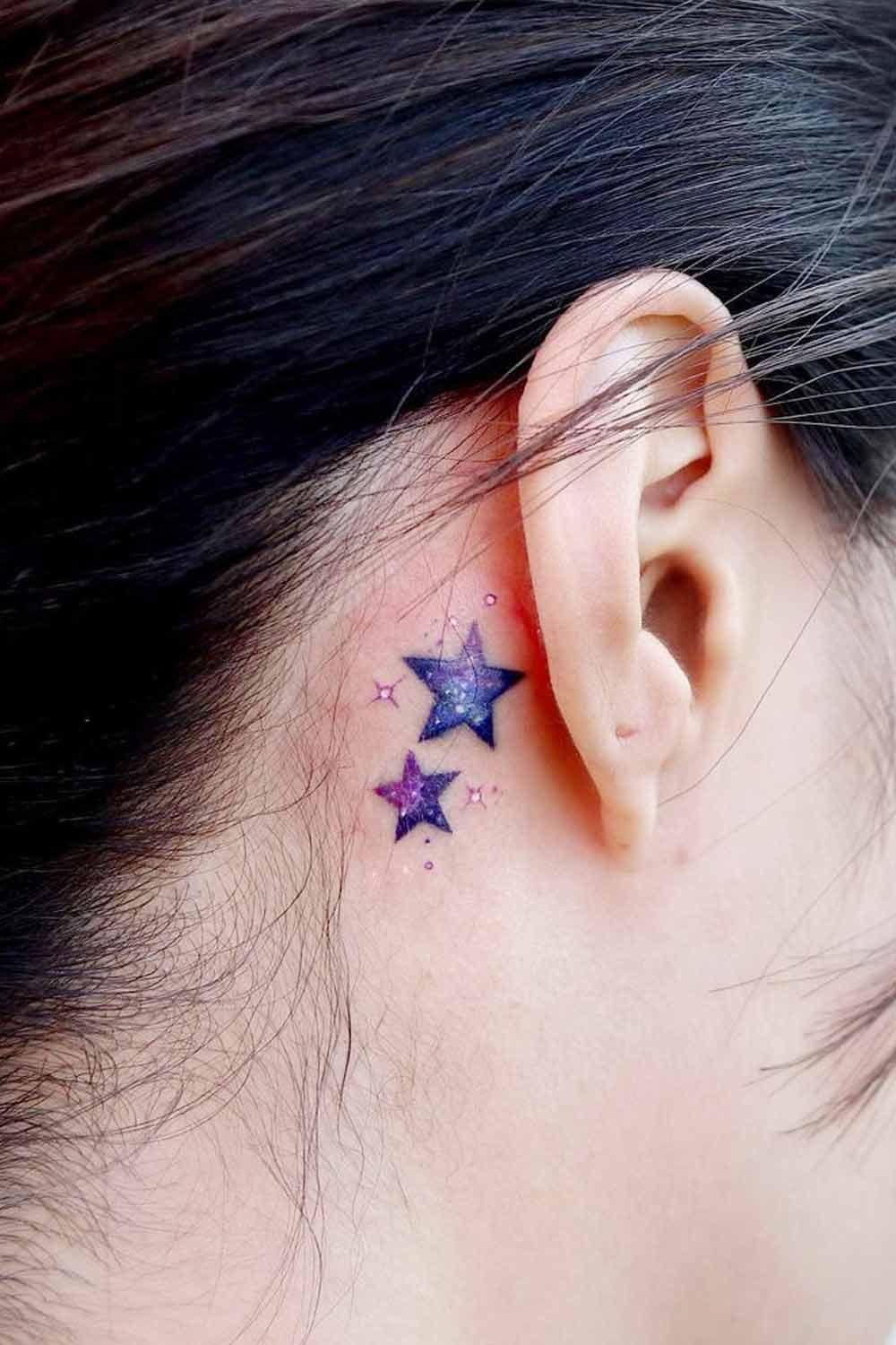 What does the tattoo of an initial with stars mean? | tattooists