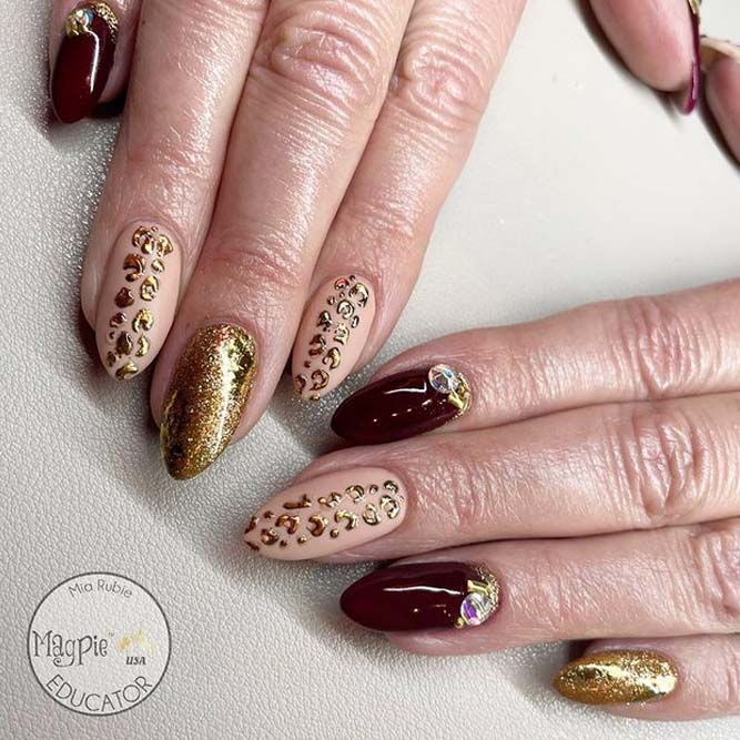 Burgundy and Gold Nails