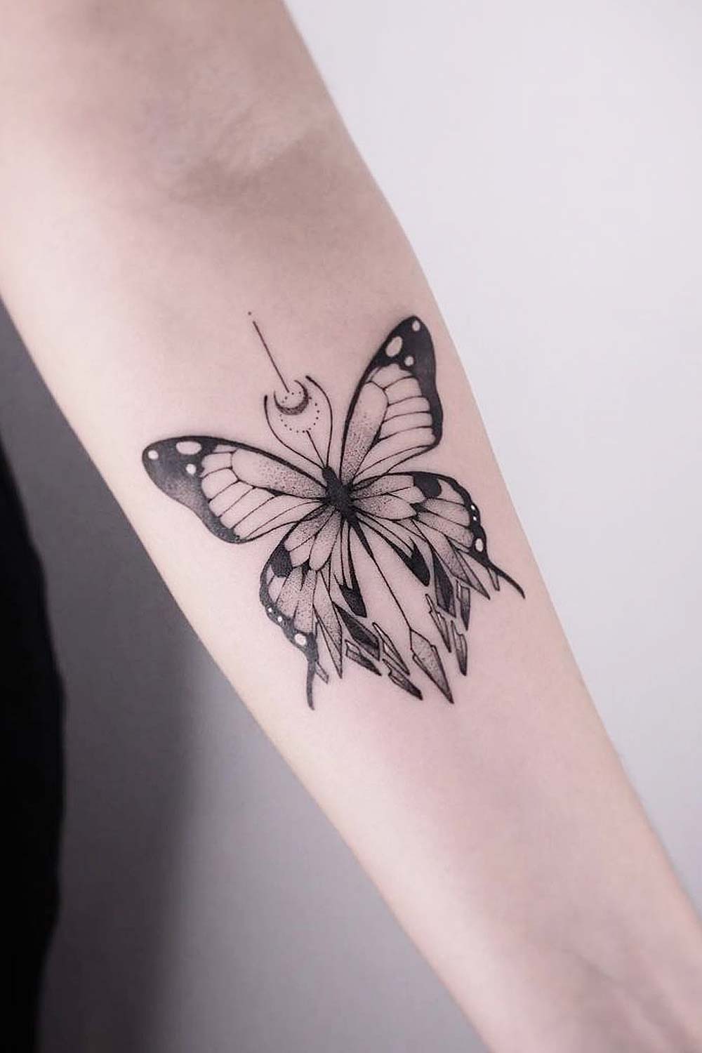 Minimalistic Butterfly Tattoo