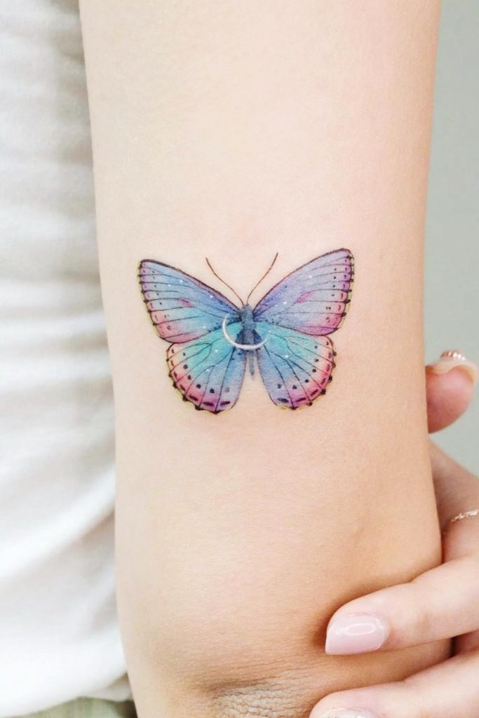 Small flower tattoo | colour flower tattoo idea | Name tattoo designs,  Armband tattoo design, Tattoo lettering