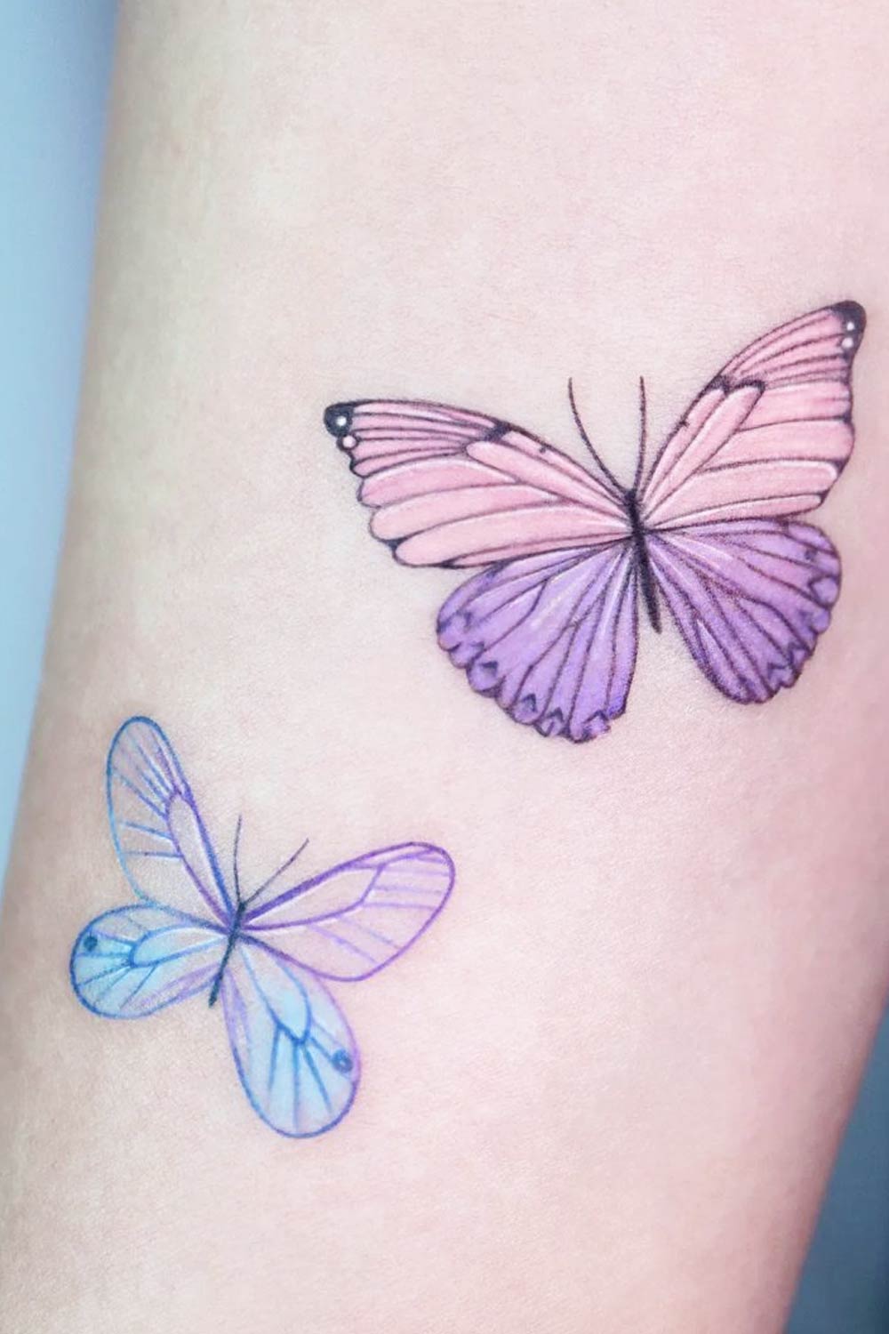 Blue and Purple Butterflies Tattoo