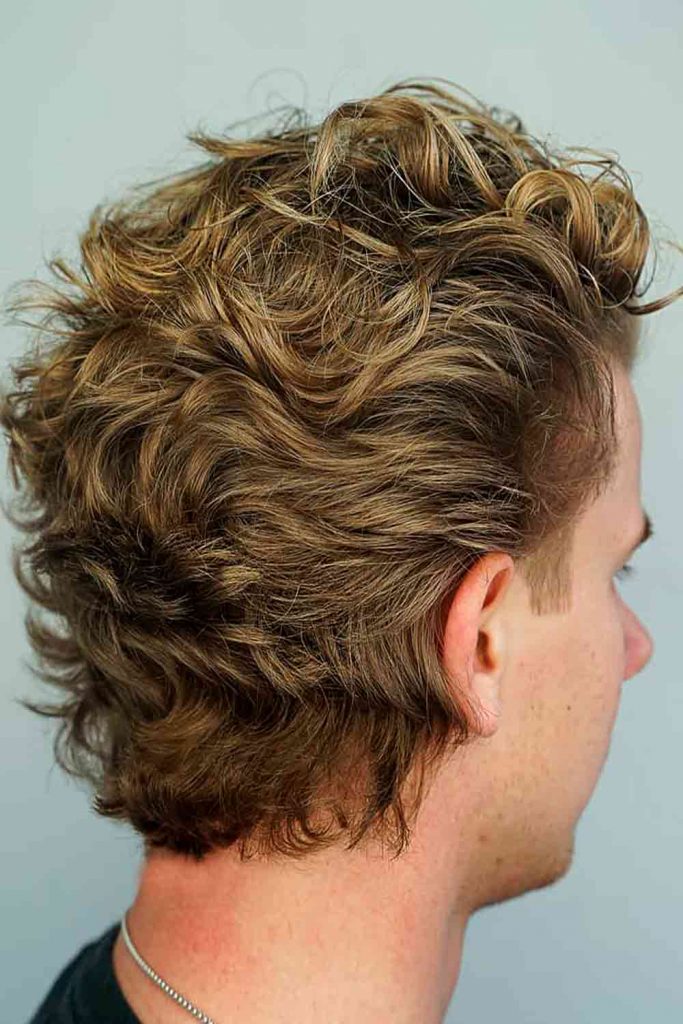 mens medium length hairstyles brushed back curly