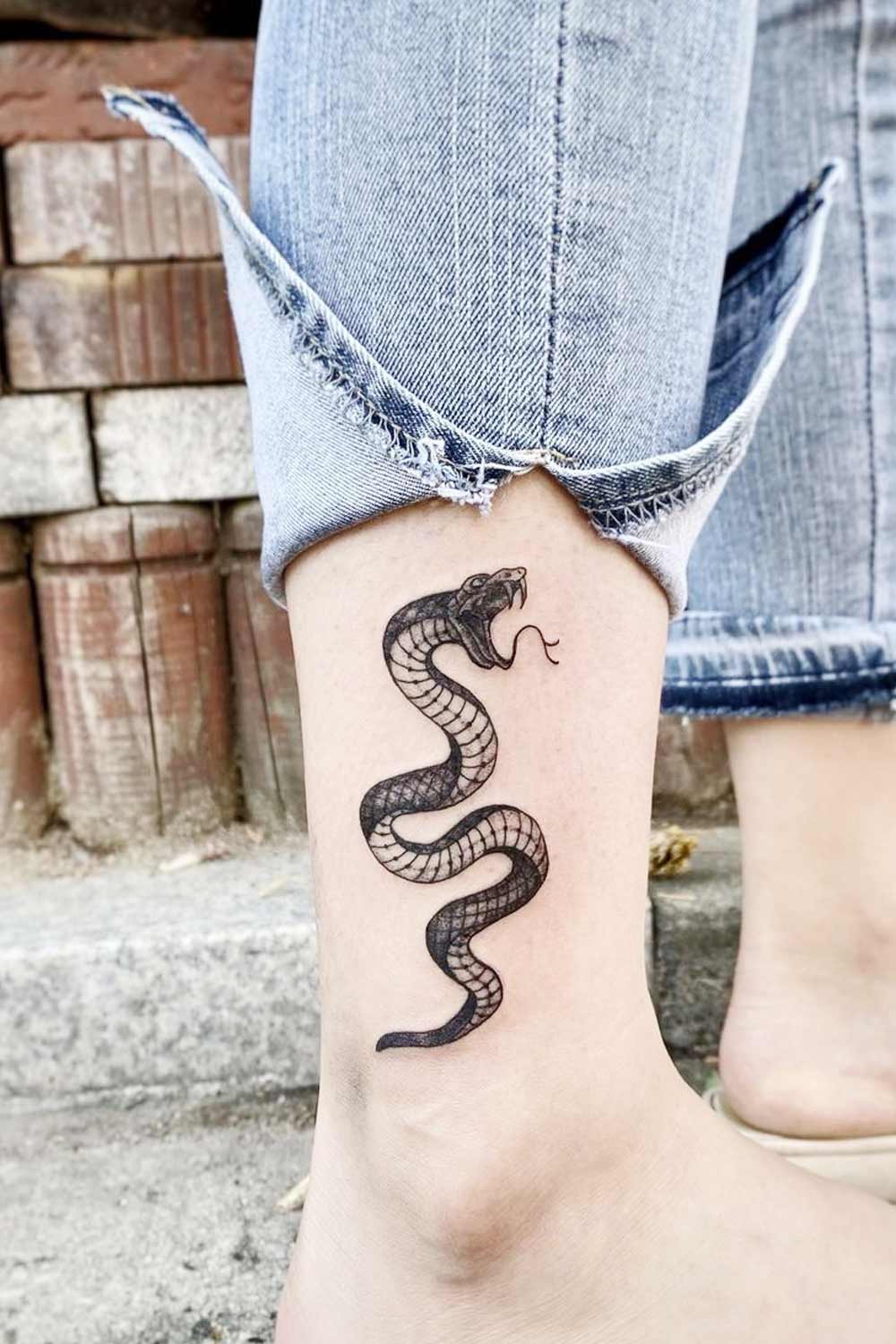 Small Minimalist Snake Tattoo on Ankle