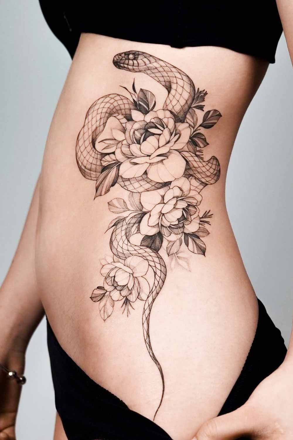 Side Body Snake with Flowers Tattoo Design