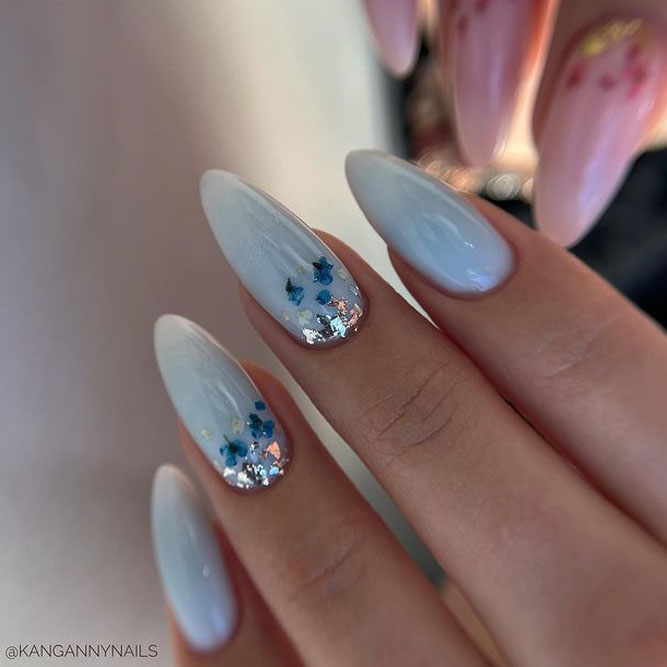 Baby Blue Stiletto Nails with Flowers