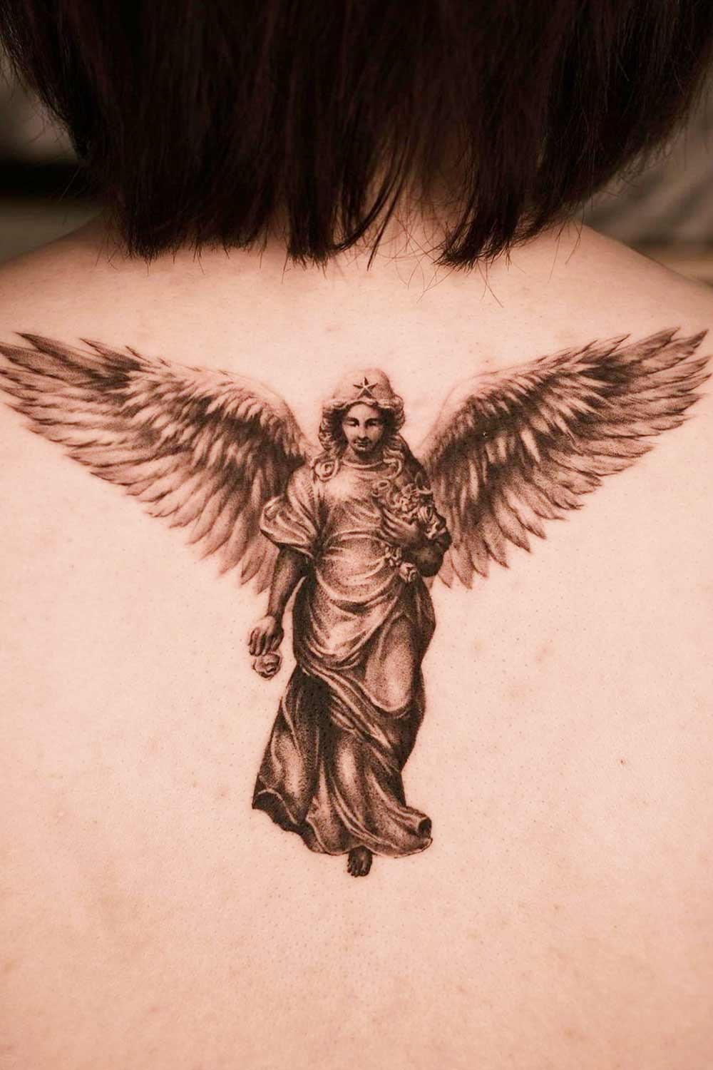 Back Tattoo with Angel Statue