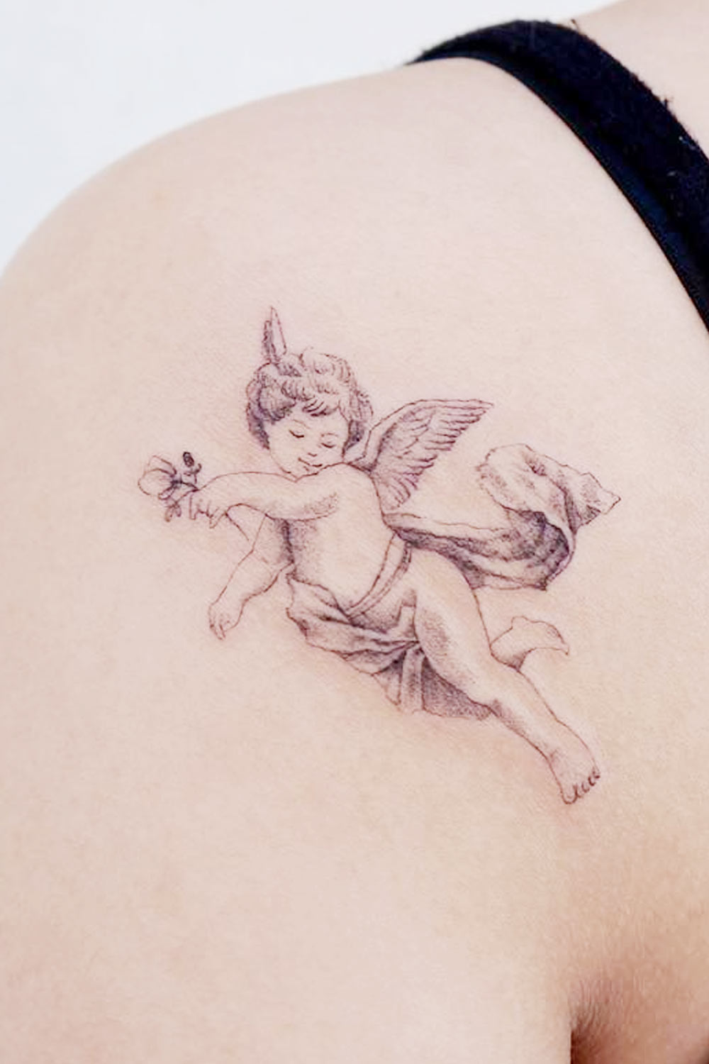 Small Baby Angel with Flower Tattoo