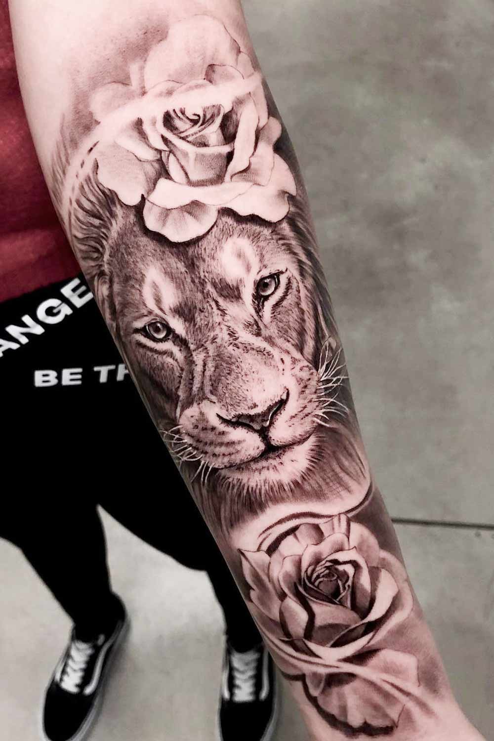 Lion with Flowers Tattoo