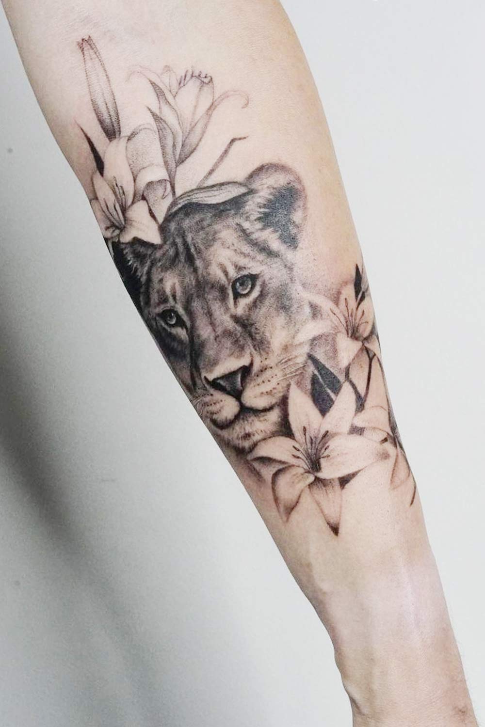 Floral Tattoo with Lioness