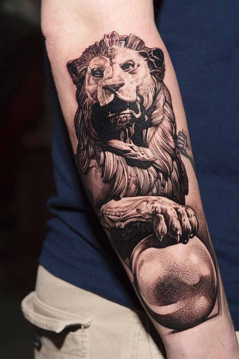 Lion Statue Tattoo Design