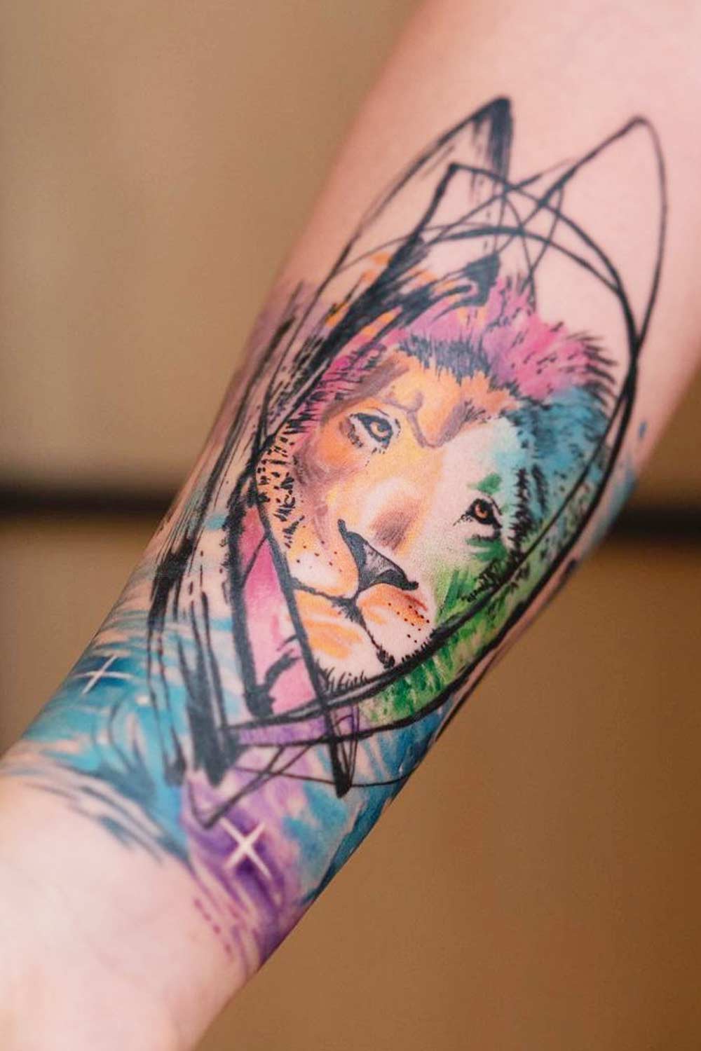 Watercolor Lion Tattoo on Arm