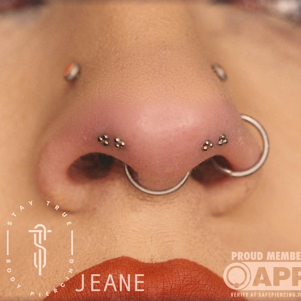 Lower Nostril Piercings with Septum Piercing