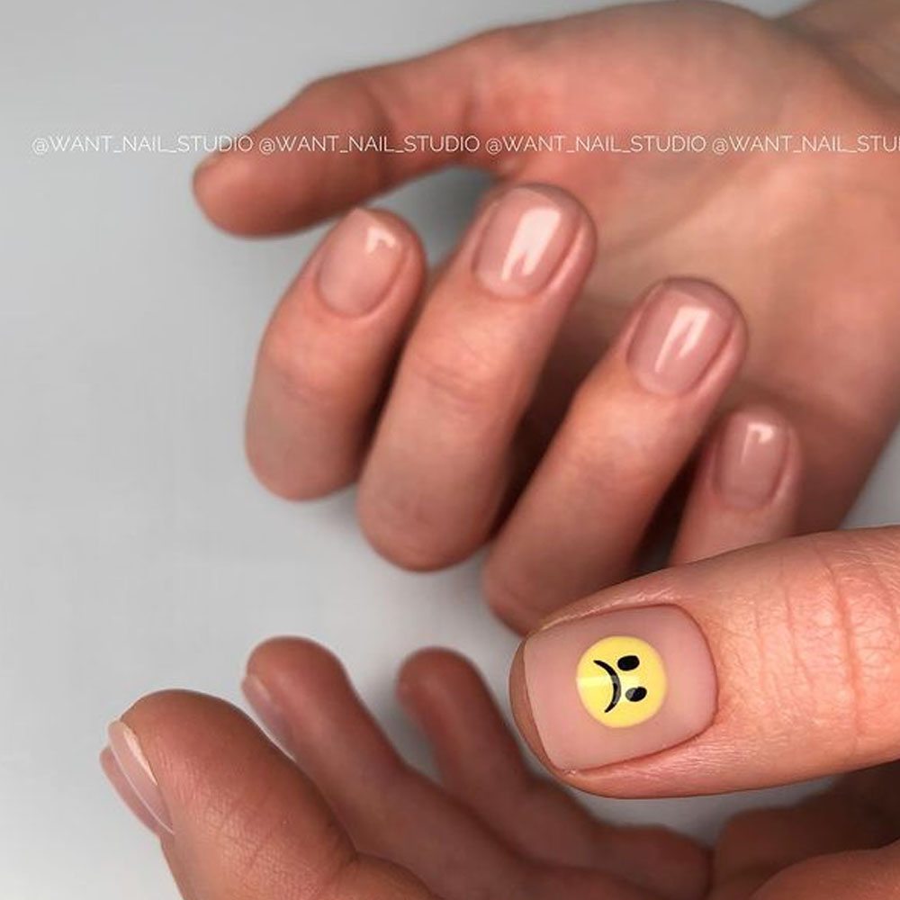 Natural Nails with a Smiley Accent