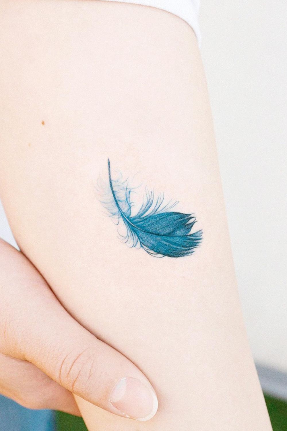 Minimalist Feather Tattoo Design
