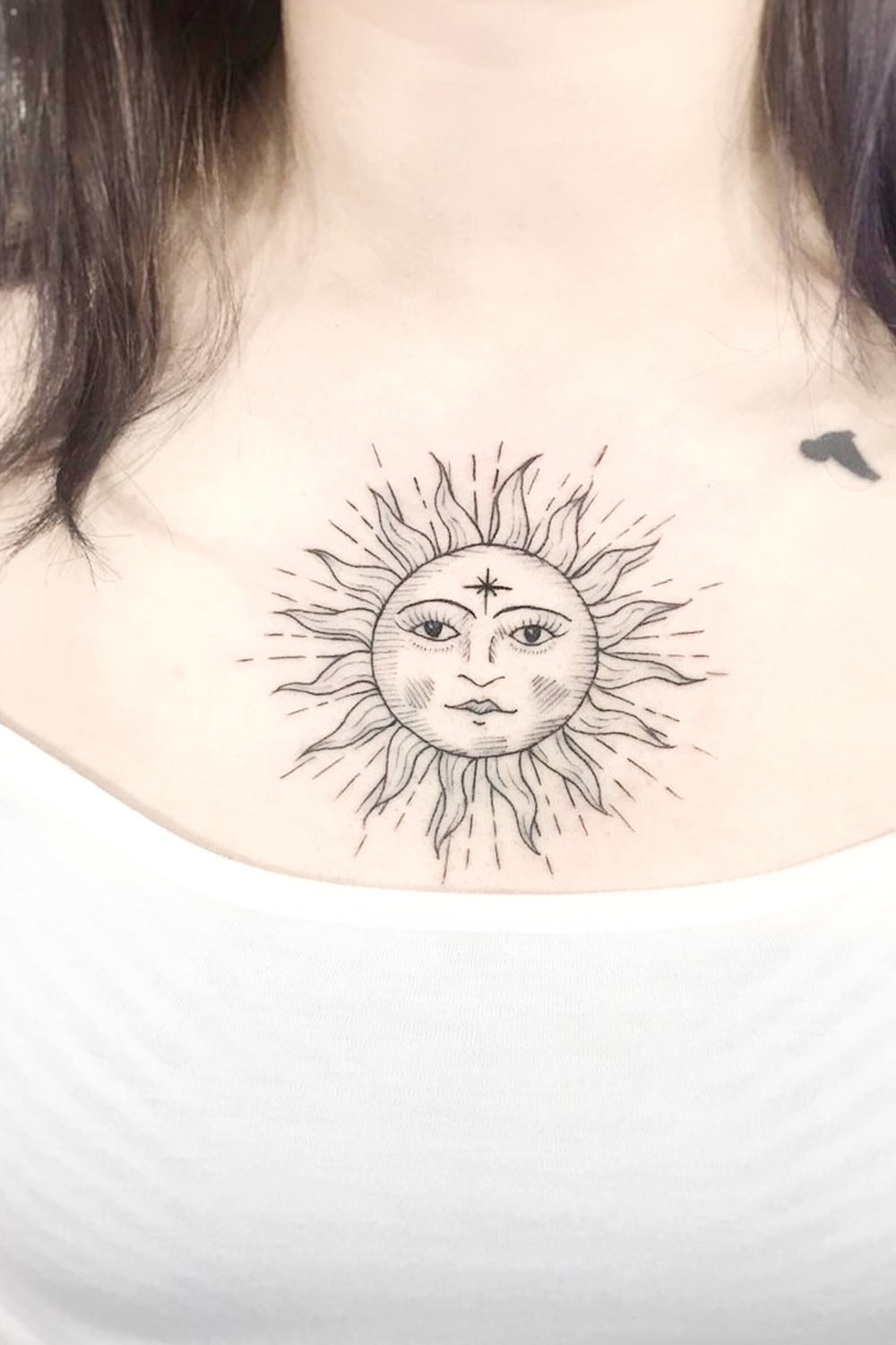 Sun Tattoo on Chest