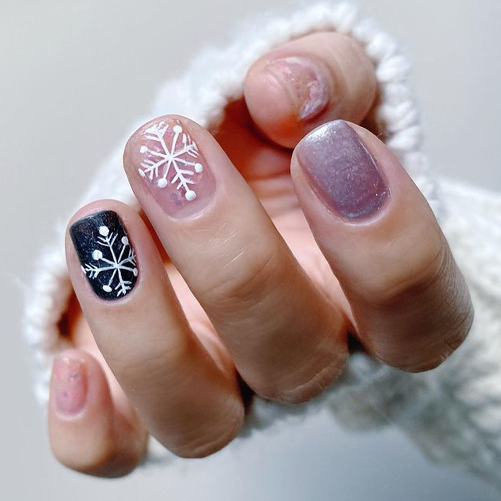 Snowflakes And Glitter Winter Nails