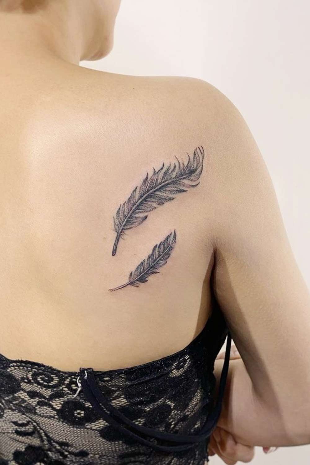 feather tattoo shoulder black double