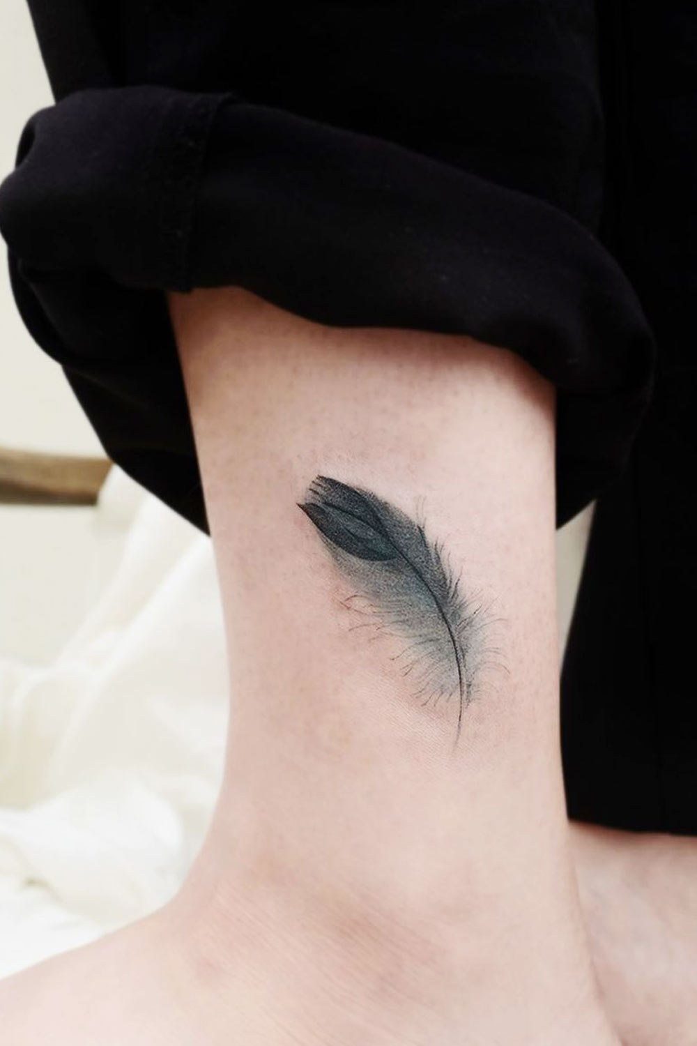 Feather Tattoo Design in Realistic Style