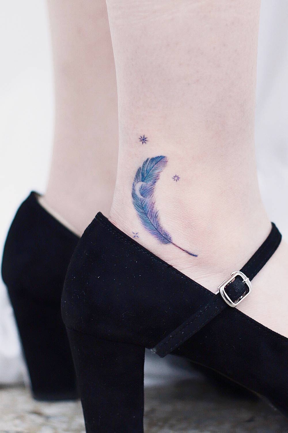 Ankle Feather Tattoo with Stars