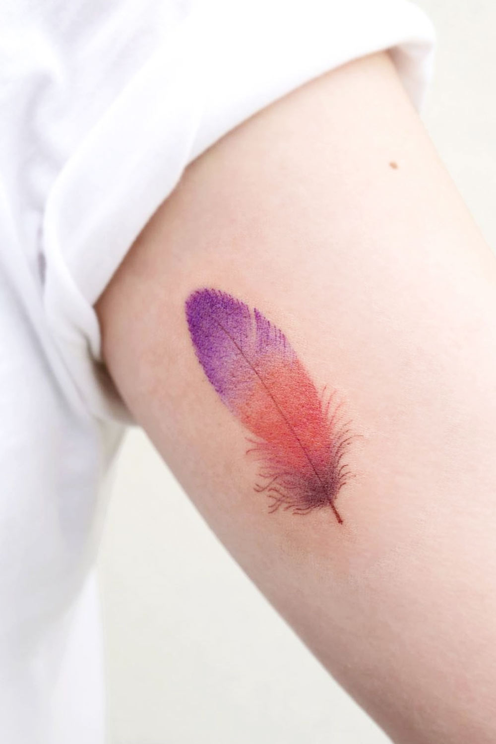 Orange and Purple Feather Tattoo