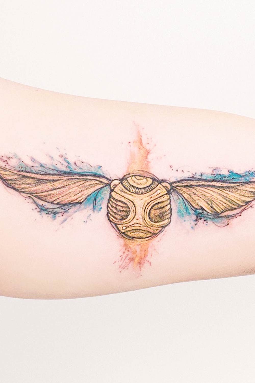 Watercolor Golden Snitch Tattoo