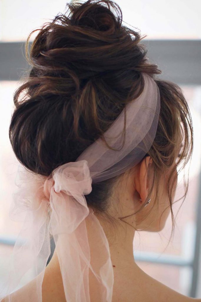Updo Hairstyle With Low Bow