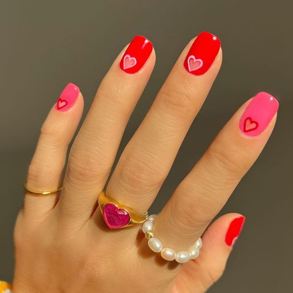 Pink and Red Hearts on Valentines Nails