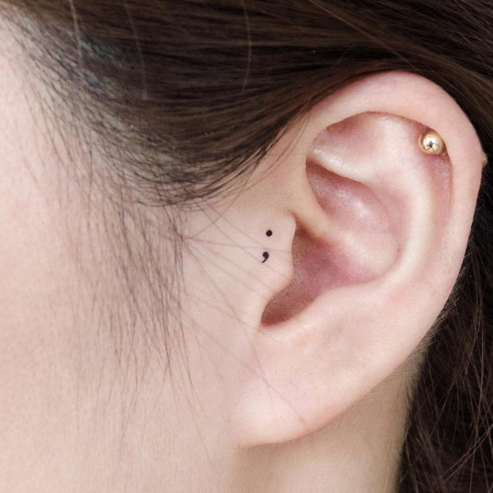 Ear Semicolon Tattoo