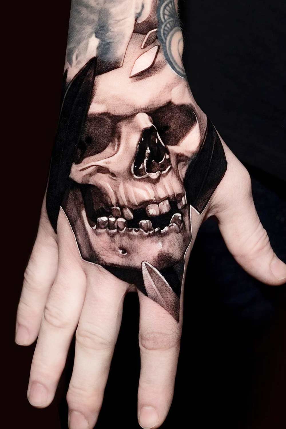 Hand Skull Tattoos