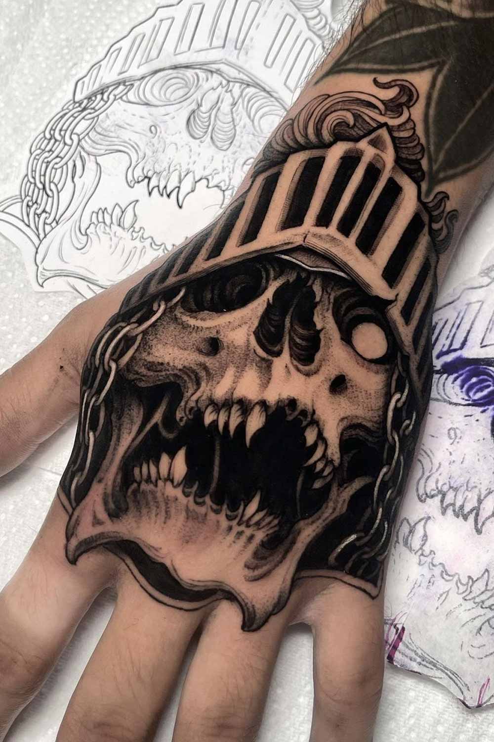 Hand Skull Design Tattoo
