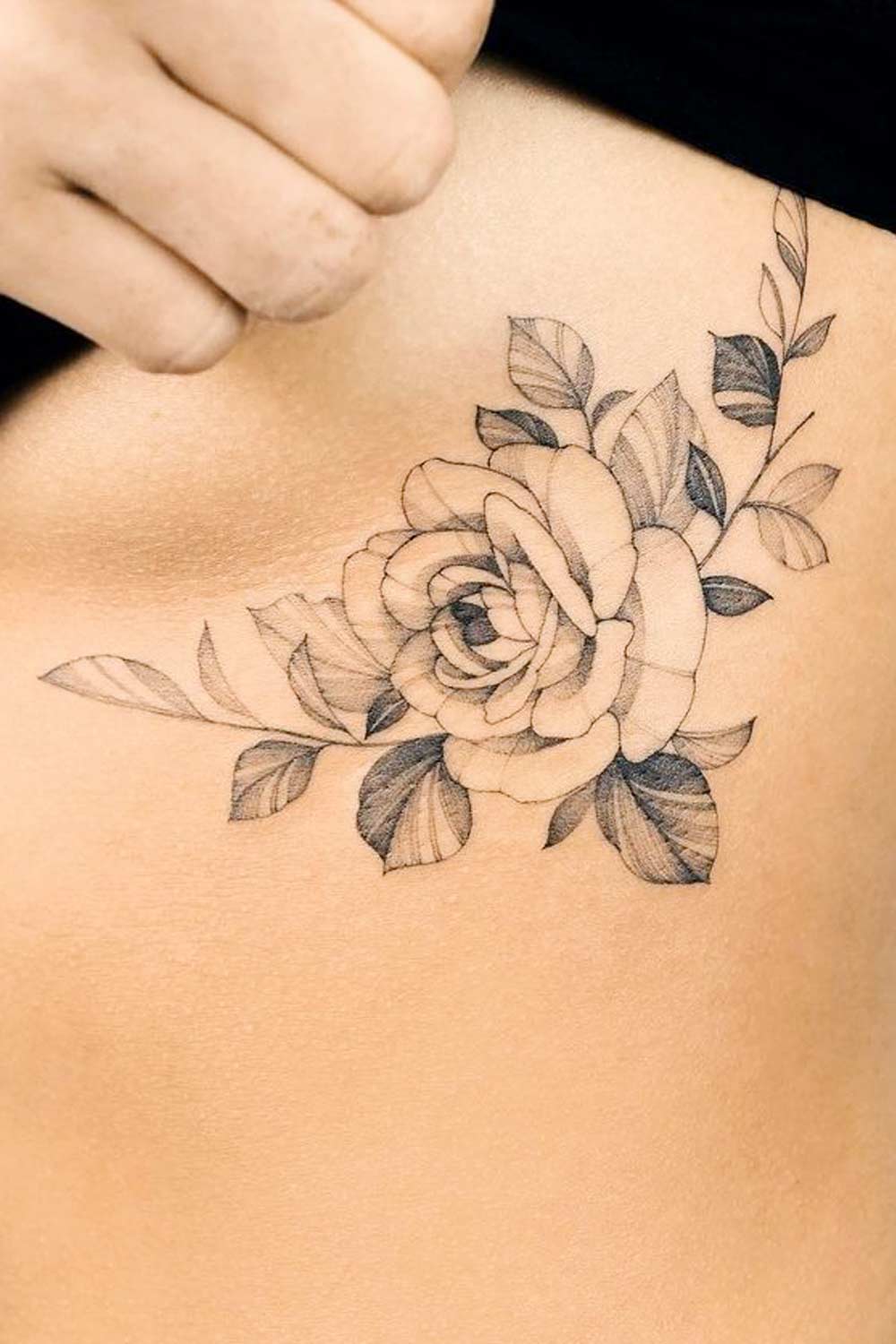 Sternum Rose Flower Tattoo
