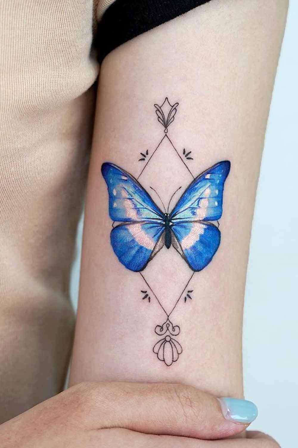 Blue Watercolor Butterfly Tattoo with Geometric Elements