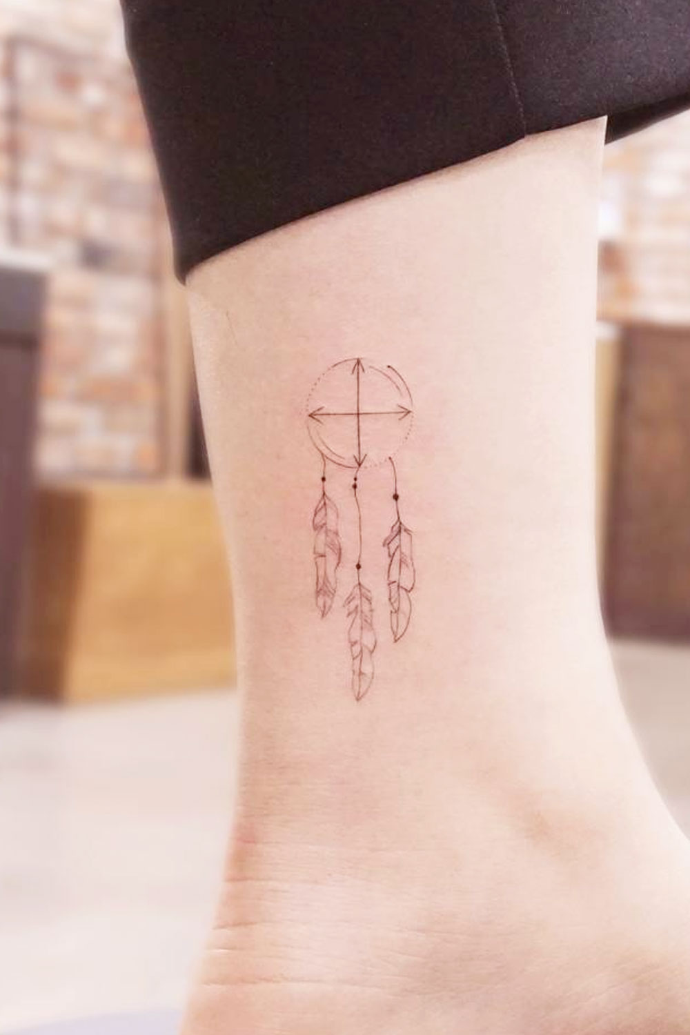 Small Dream Catcher on Ankle Tattoo
