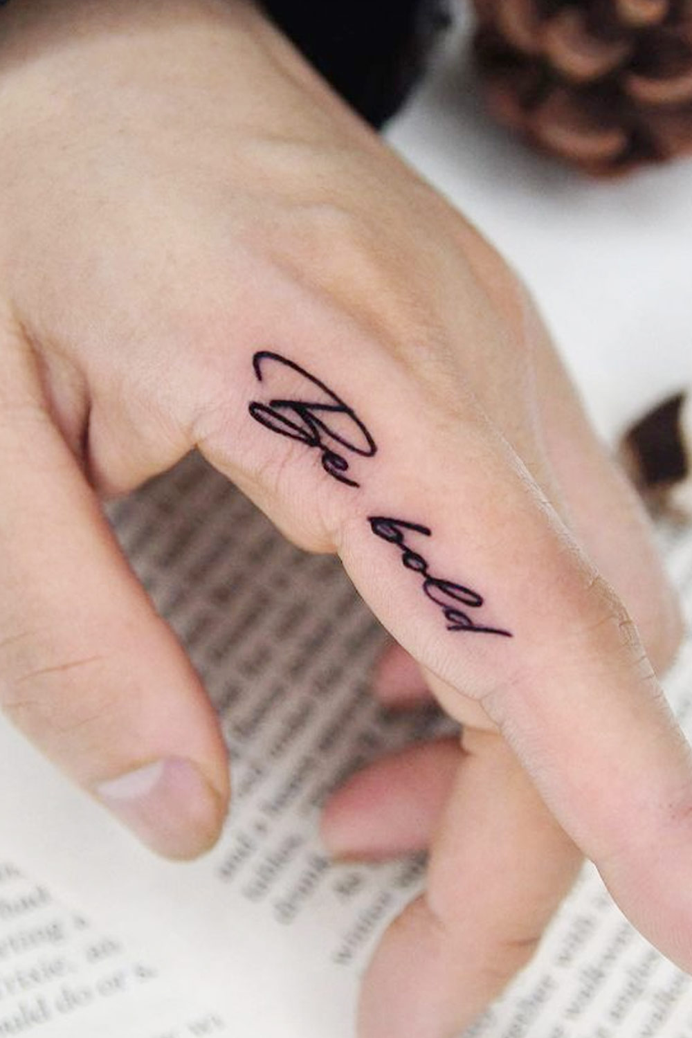 Lettering Finger Tattoo