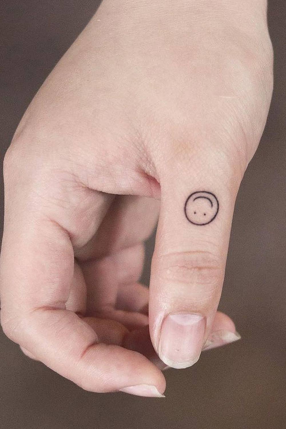 Emoji Finger Tattoo