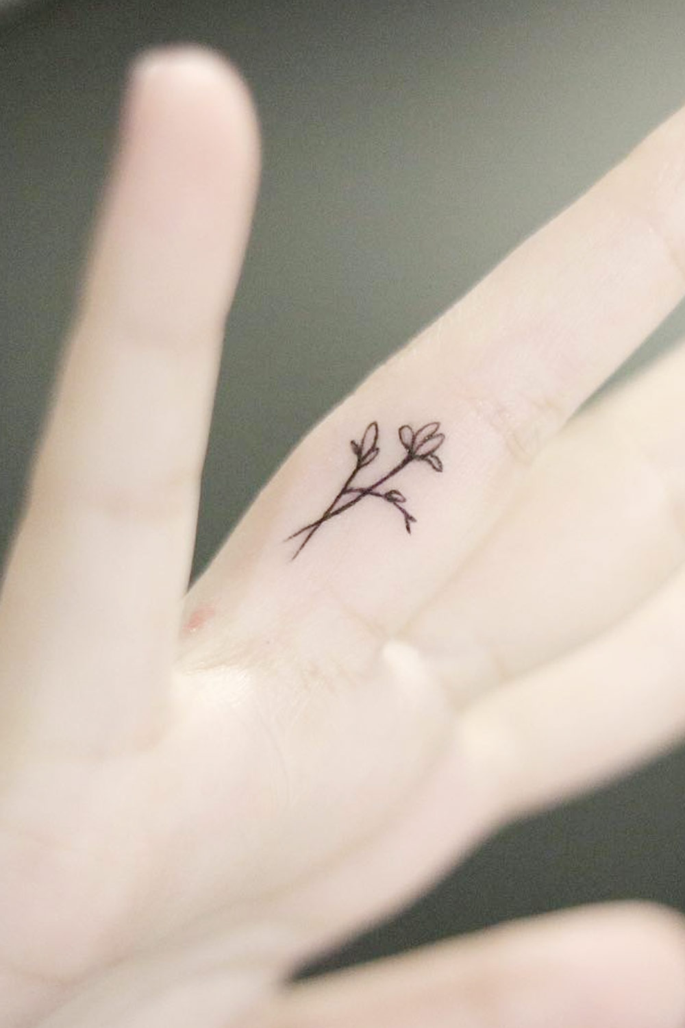 Floral Finger Tattoo Design