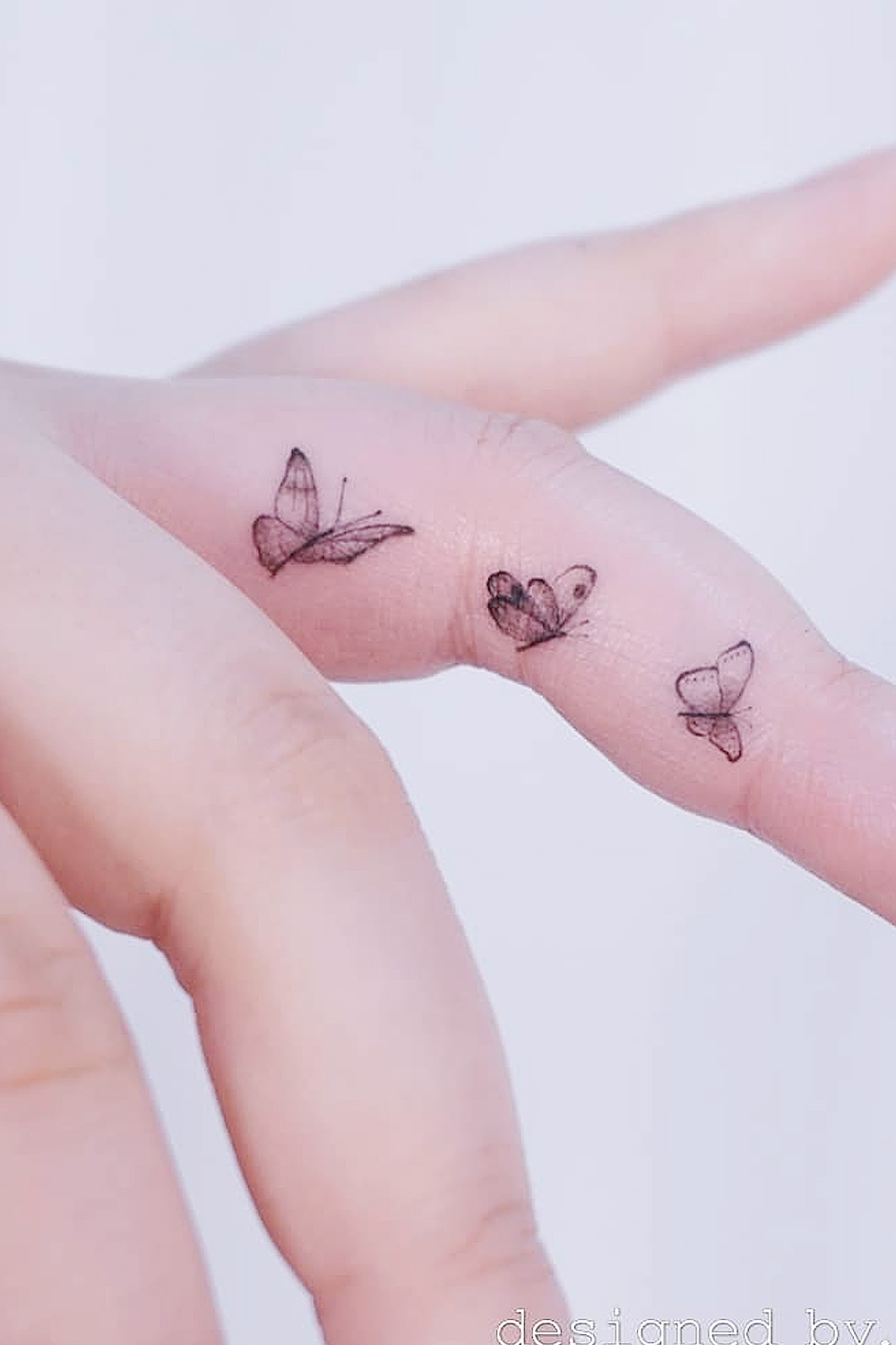 Minimalistic Butterflies Tattoos